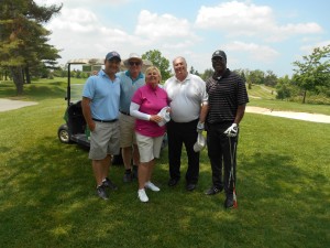 Lawyers from Prouse, Dash & Crouch, LLP get a golf lesson from LGPA champion Sandra Post.  